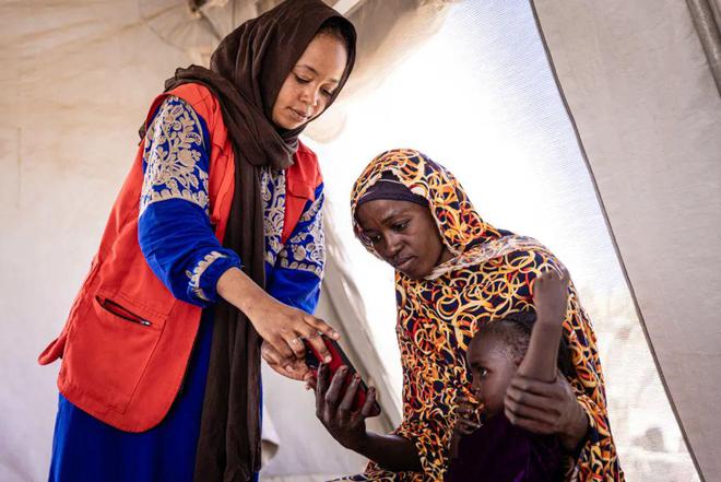 “我们从苏丹逃到这里除了捡回条命已一无所有”(图4)